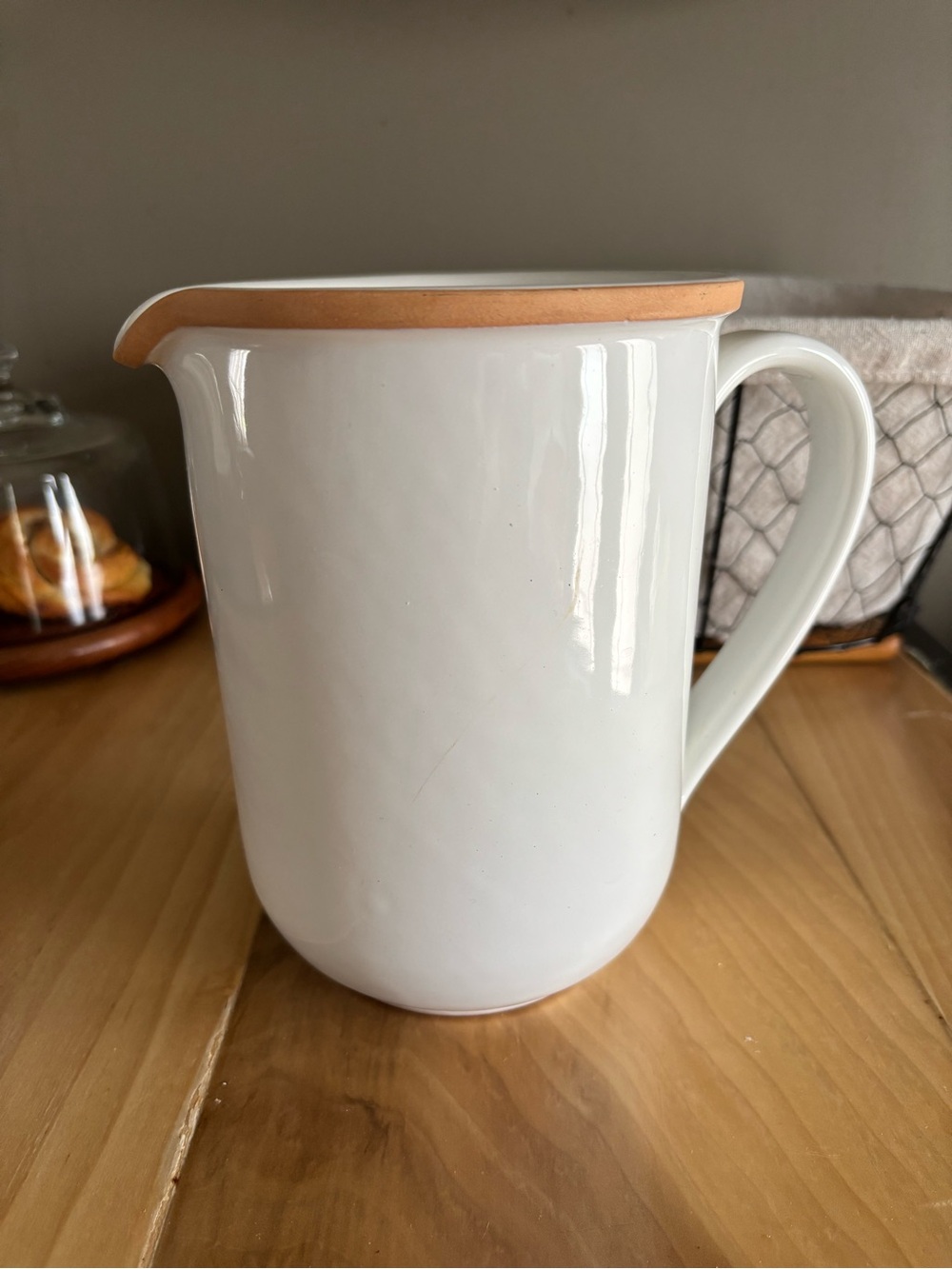 White Ceramic Pitcher with Terracotta Rim